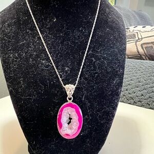 Pink agate slice geode pendant on a sterling silver chain. Pendant also sterling
